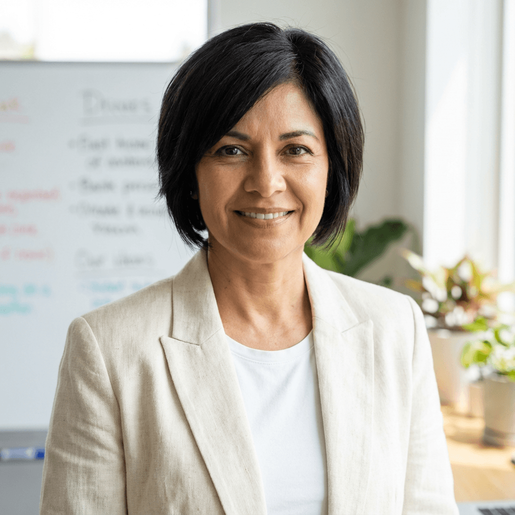 Elena Rodriguez, VP of Patient Care Services, professional headshot
